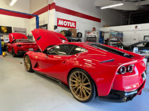 two red ferraris Above and Beyond Performance, LLC